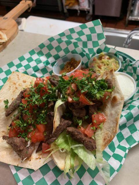 Gyro Pita wrap with either Lamb or Chicken.