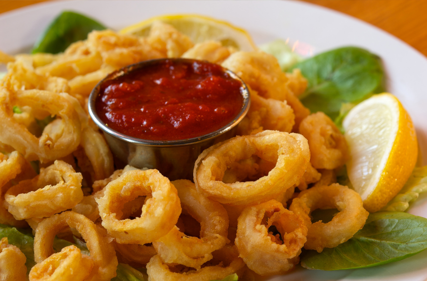 Crispy Calamari - Served with marinara sauce on the side