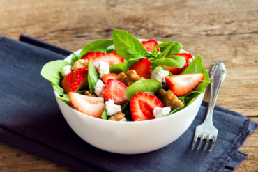 Strawberry Salad - Mix green with fresh strawberry, walnut, and feta cheese